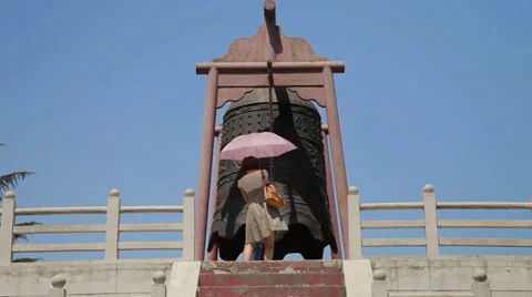 Mother and son are ringing the bell Stock Footage 36070548