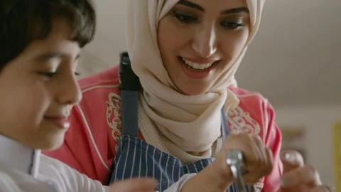 Mother and son baking a cake together. Stock Footage 88115710