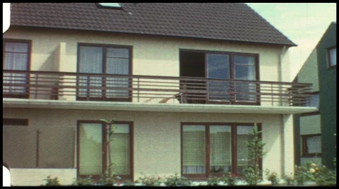 Mother and son on balcony (vintage 8 mm amateur film) Stock Footage