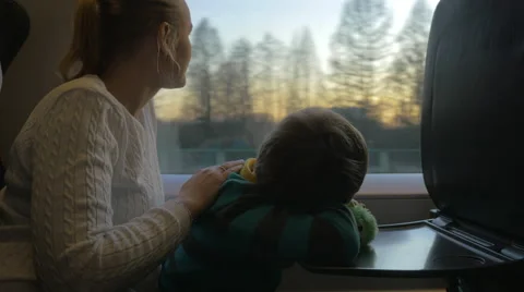 Mother and son commuting by train Stock Footage 67470990
