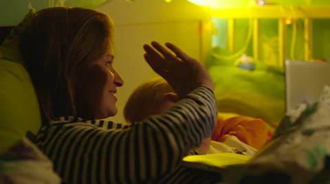 Mother and Son Doing High-Five Stock Footage 56727578