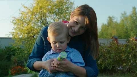 Mother and Son Exploding Party Popper Video stock 56253599