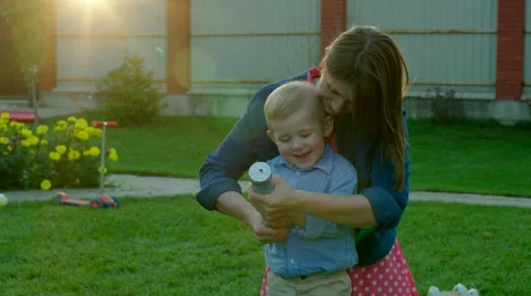 Mother and Son Exploding slapstick Stock Footage 58789867