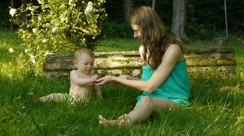 Mother And Son Having Fun In Nature Stockbeeldmateriaal 54292710