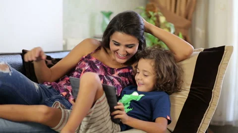 Mother and son having fun with a tablet pc Stock Footage 54413662