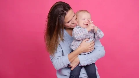 Mother and son having fun indoors Stock Footage 82973166