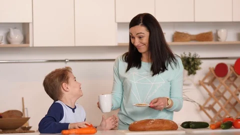 Mother and son in the kitchen Stock Footage 89266645