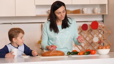 Mother and son in the kitchen Stock Footage 89283513