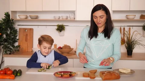 Mother and son in the kitchen Stock Footage 89320343