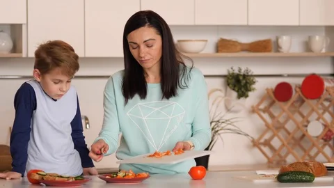 Mother and son in the kitchen Stock Footage 89333711