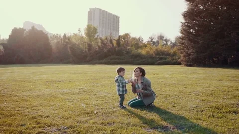 Mother and son Making bubbles Video stock 75205939