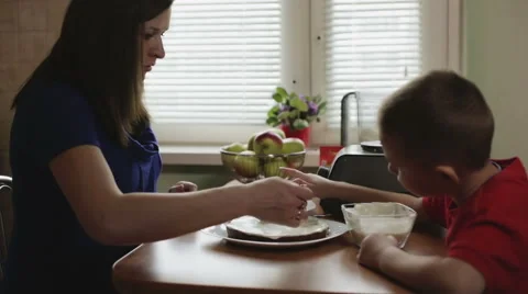 Mother and son making a cake Stock Footage 62820211