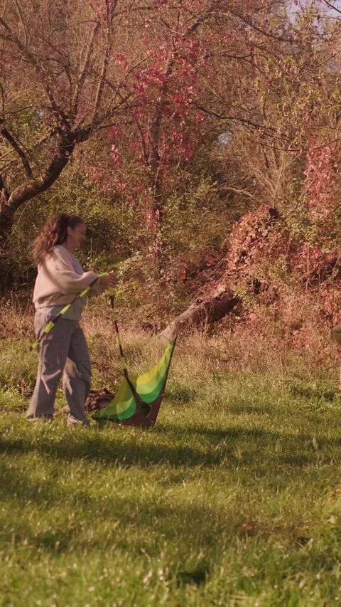 A mother and son run through the forest, enjoying quality weekend time together, Stock Footage 289736460
