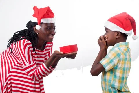 Mother and son with Santa's hats. Stock Photos
