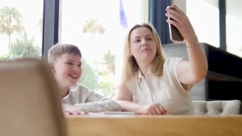 Mother and Son Taking a Selfie Together Stock Footage 316980586