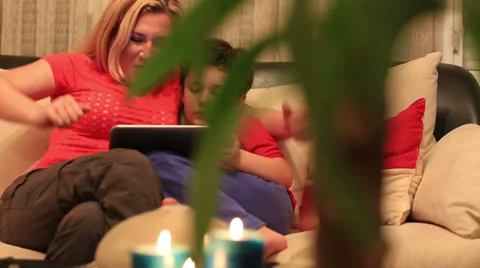 Mother and son using digital tablet Stock Footage 37874398