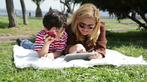 Mother and son using digital tablet Stock Footage 37982888