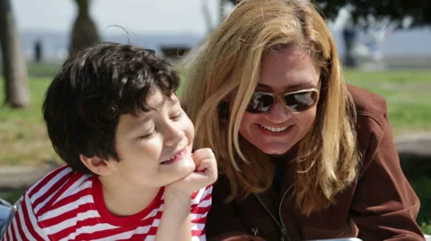 Mother and son using digital tablet Stock Footage 37983823