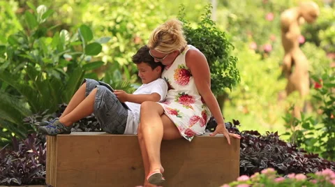 Mother and son using digital tablet Stock Footage 41323017