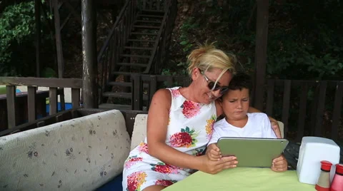Mother and son using digital tablet Stock Footage 41508837