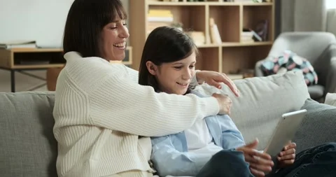 Mother and Son Using digital tablet for Video Call and Waving Greetings Stock Footage 254502273