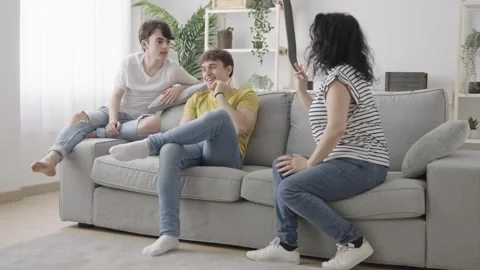 Mother and sons having discussion at home Stock Footage 242587881