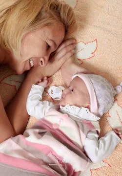 Mother with babe Stock Photos