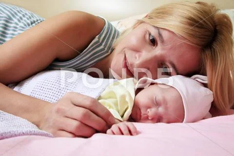 Mother with babe Stock Photos