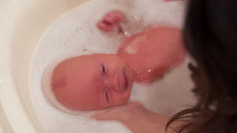 How To Bathe Newborn Baby Boy : Baby Bath Stock Video Footage Royalty Free Baby Bath Videos Page 5 / Fill the baby bath or sink with water it doesn't matter how much water since you're just sponge bathing, but you won't need much.