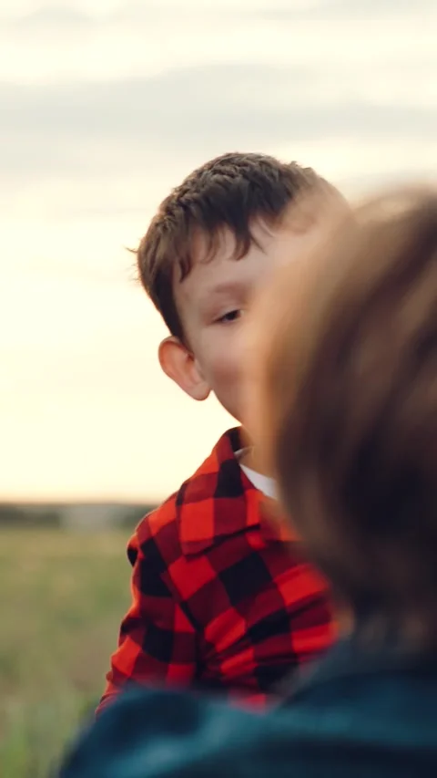Mother child kid boy son parent hugs happy family dream running flight field Stock Footage 276870141
