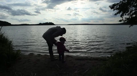 Mother with child on the lake Stock Footage 41658024