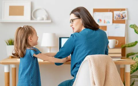 Mother with child working on the computer Stock Photos
