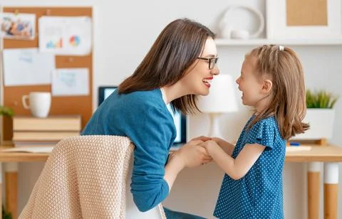 Mother with child working on the computer Stock Photos