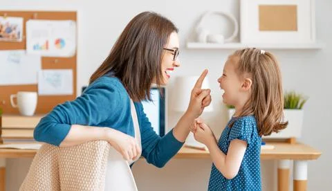 Mother with child working on the computer Stock Photos
