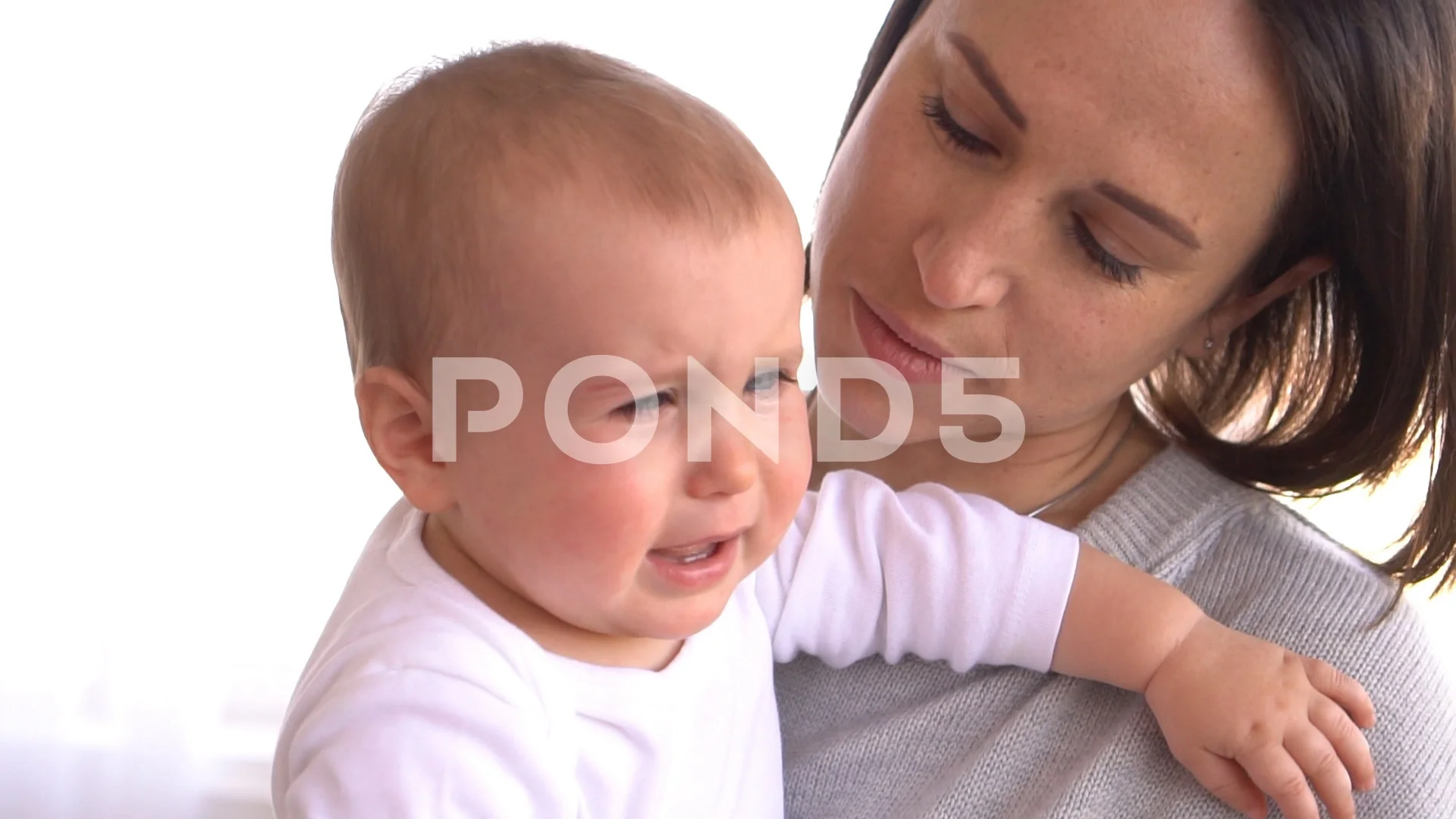 Mother Comforting Crying Baby Girl Video Clip 98940652