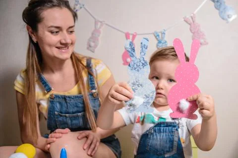 Mother with creative kid having fun time together Stock Photos
