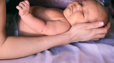 Mother doing exercises, massage, petting baby Stock Footage 46203653