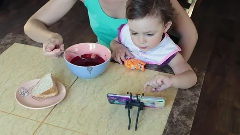 Mother feeds the child. Stock Footage 90278509