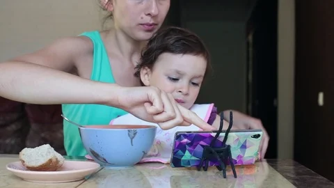 Mother feeds the child. Stock Footage 90285249