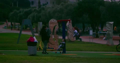 Mother having fun in the park With her children with masks on Stock Footage 146992971