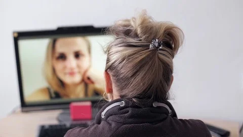 Mother having a videocall Video stock 70383650