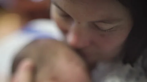 Mother Holding Newborn Baby In Hospital With Soft Romantic Focus Stock Footage