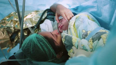 A Young Mother In Underwear With A Scar From A Cesarean Section Holds Her  Baby