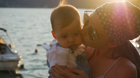 Mother hugging her young son Stock Footage 81107143