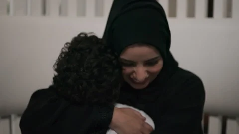 Mother hugging son Stock Footage 105803531