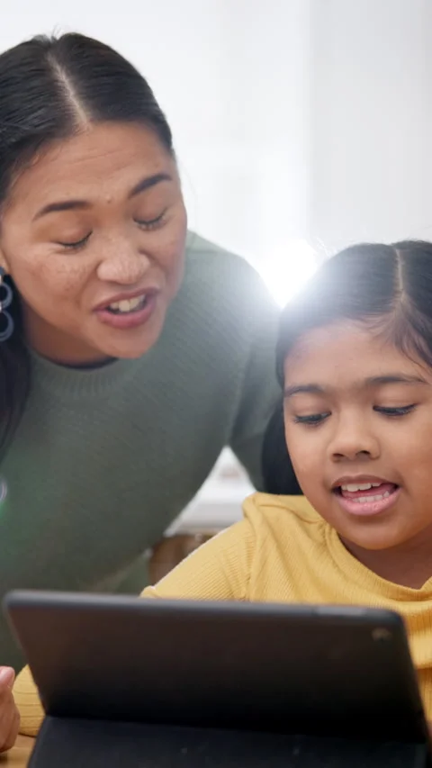 Mother, kid and tablet with help for elearning, homework assistance and Stockbeeldmateriaal 336804547