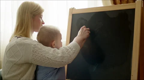 Mother Learning Her Son Writing Letters Stock Footage 60404520