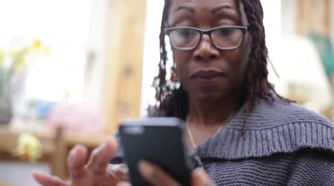 Mother Learns How To Use Smart Phone Stock Footage 49067728