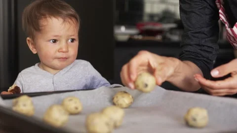 A mother making a cookie with cute boy Stock Footage 171759265