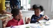 Mother Making Lunch For Kids Stock Footage